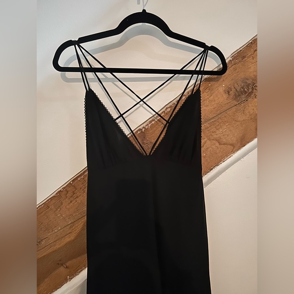 Wyldr Small strappy black dress. Super great fit, fits more small medium. - Picture 2 of 5